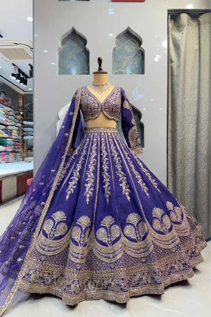 A fully stitched lehenga is a convenient, ready-to-wear ethnic outfit that arrives completely pre-sewn to a standard size, eliminating the need for a tailor. It comprises a flared skirt