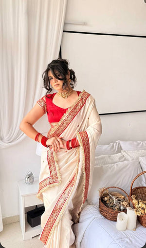 Off White Silk Saree with Red Sequin Border