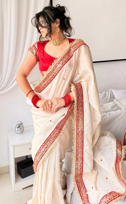 Off White Silk Saree with Red Sequin Border