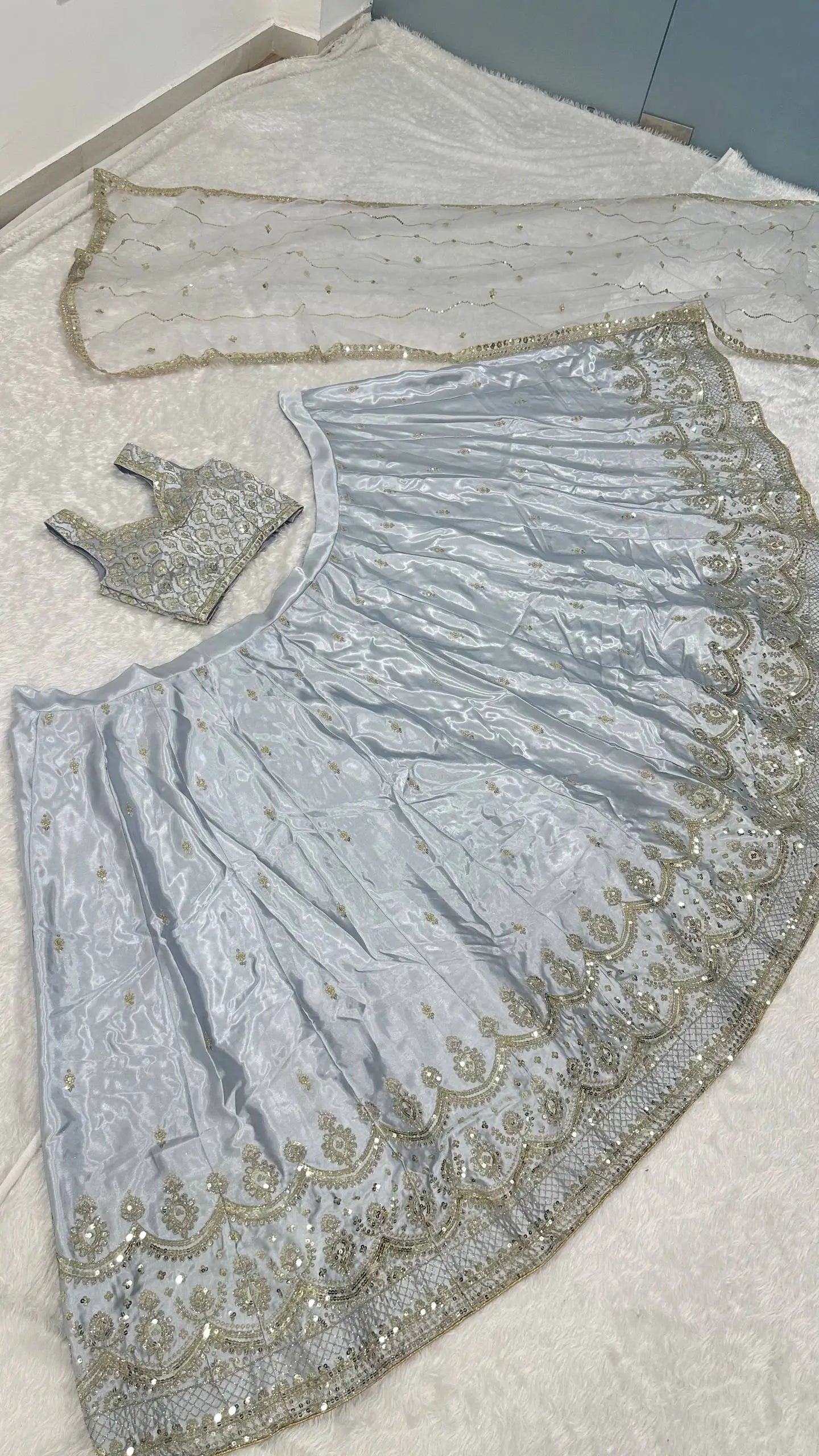 Embroidered Satin Silk Lehenga Set With Net Dupatta