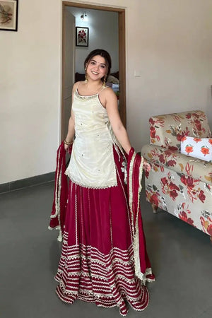 Ivory and Rani Pink Fendy Silk Lehenga Set with Real Mirror Work and Lace Detail