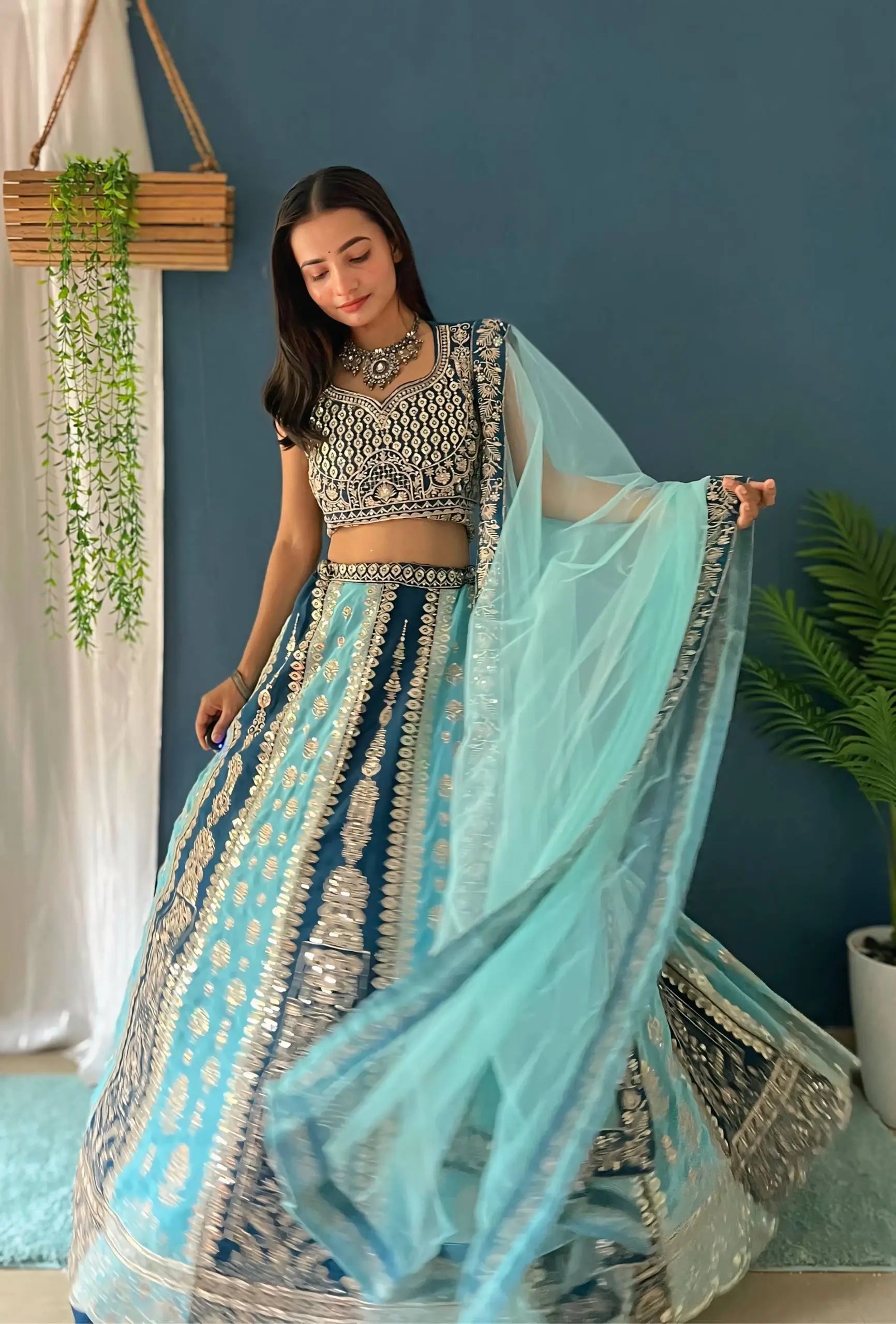 Aqua Blue Faux Georgette Embroidered Lehenga Set for Wedding and Festive Wear