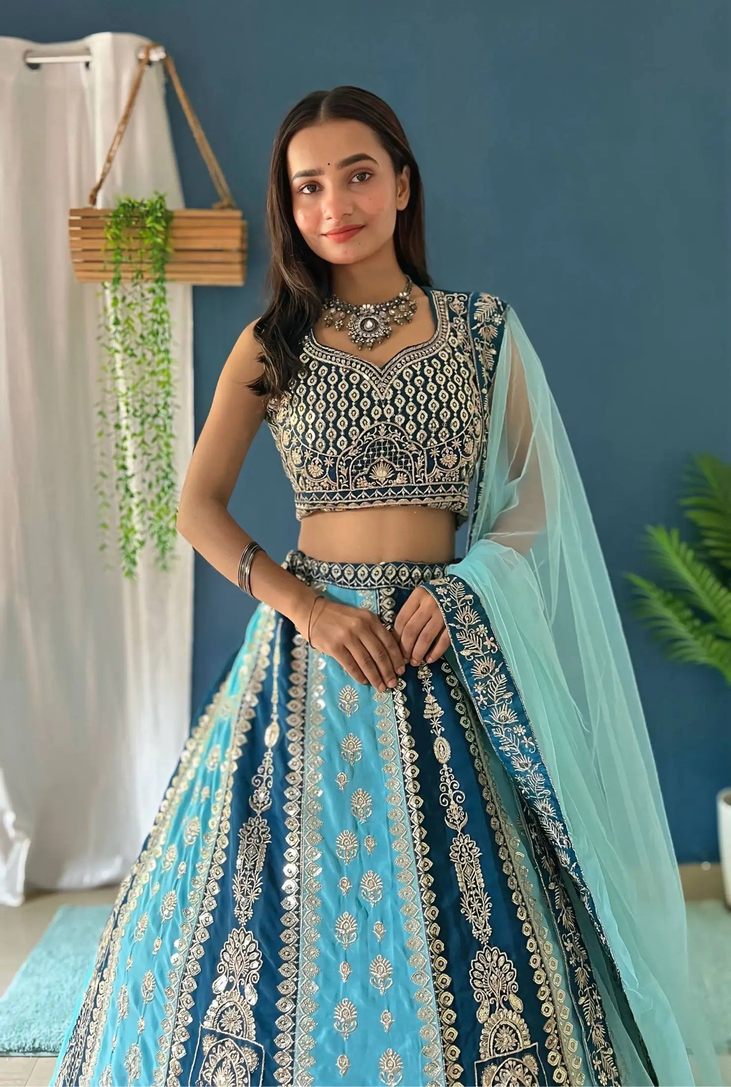 Aqua Blue Faux Georgette Embroidered Lehenga Set for Wedding and Festive Wear