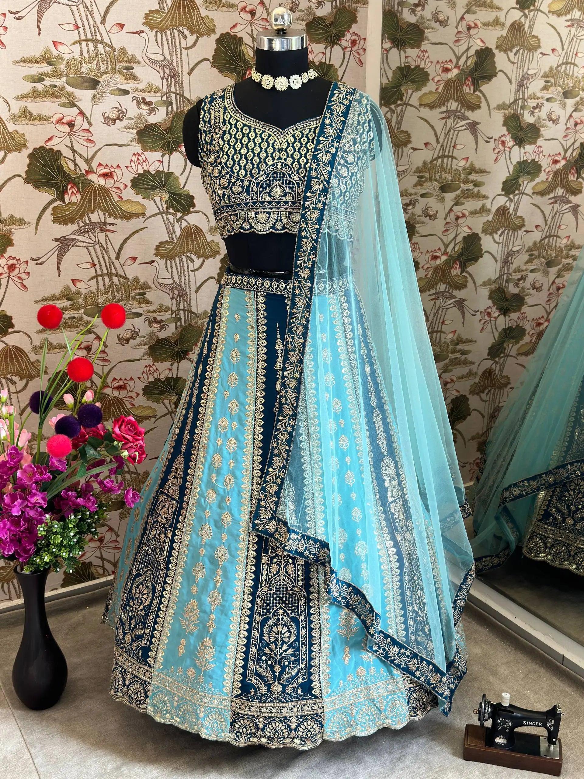 Aqua Blue Faux Georgette Embroidered Lehenga Set for Wedding and Festive Wear