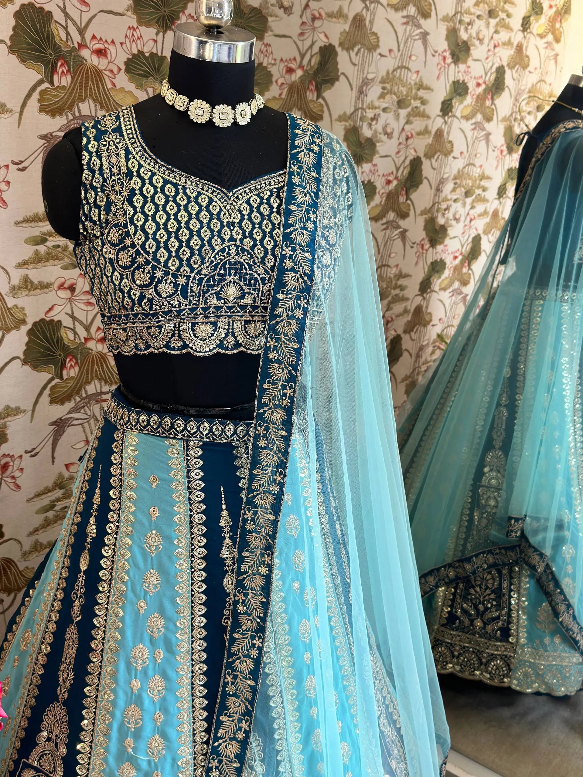 Aqua Blue Faux Georgette Embroidered Lehenga Set for Wedding and Festive Wear