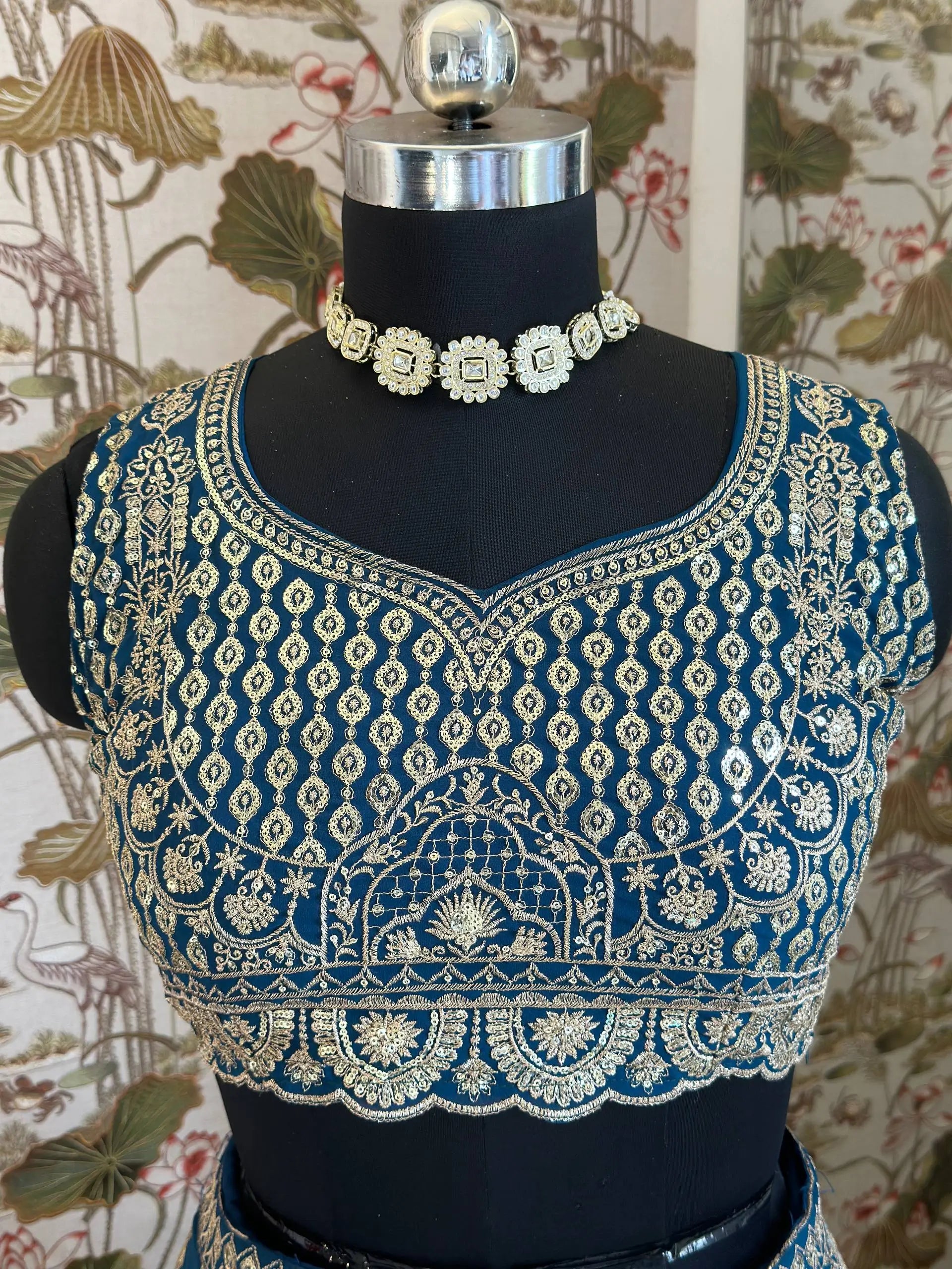 Aqua Blue Faux Georgette Embroidered Lehenga Set for Wedding and Festive Wear