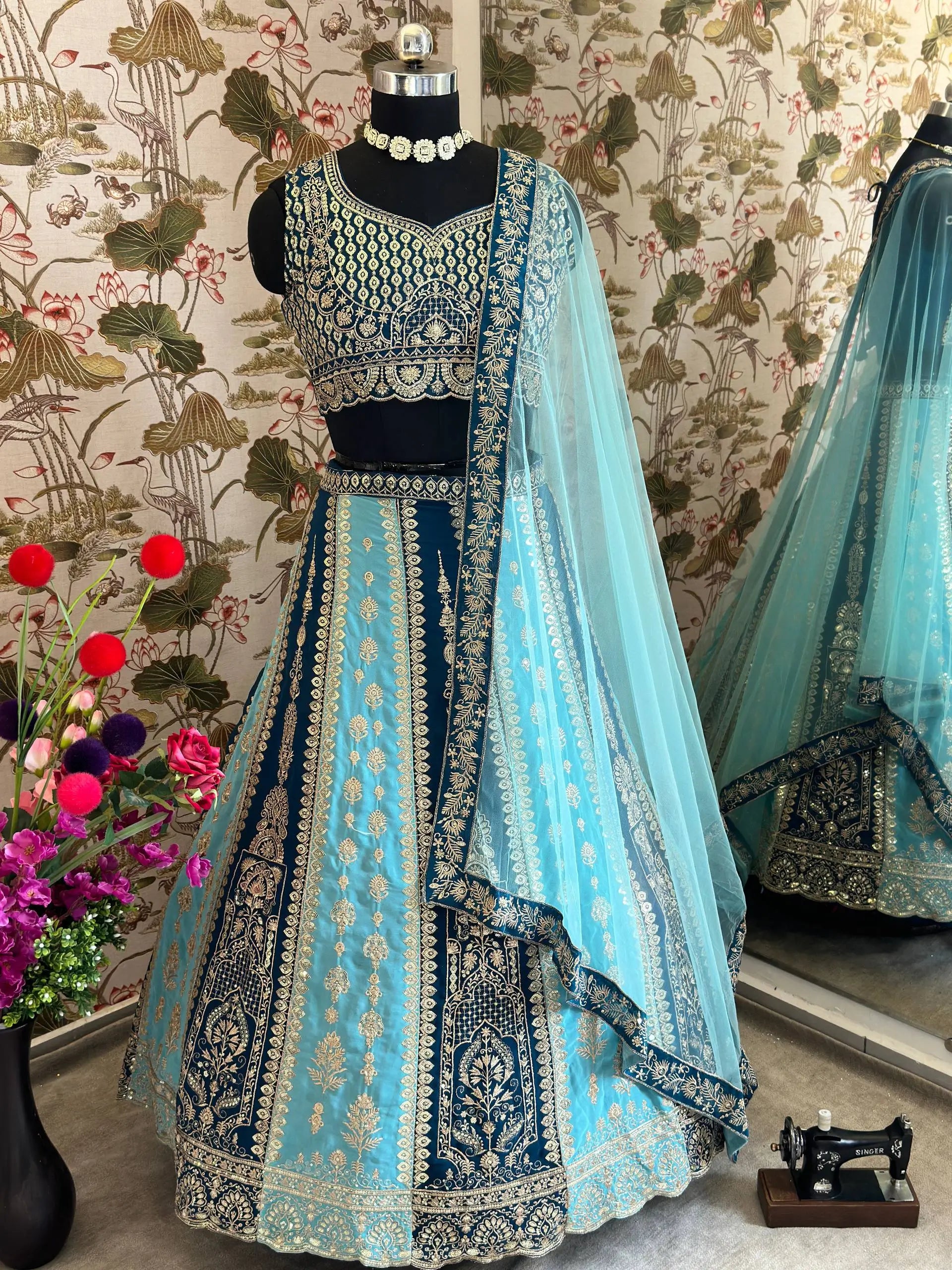Aqua Blue Faux Georgette Embroidered Lehenga Set for Wedding and Festive Wear