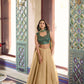 Champagne Fendi Lehenga with Teal Blouse