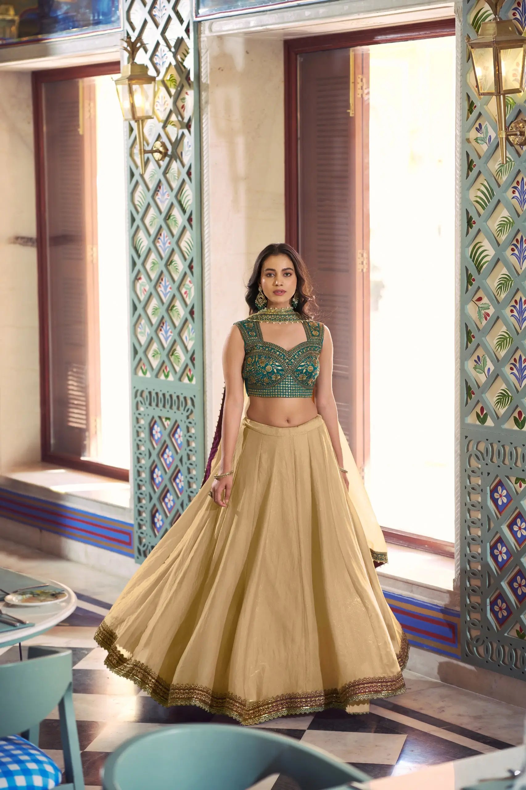 Champagne Fendi Lehenga with Teal Blouse