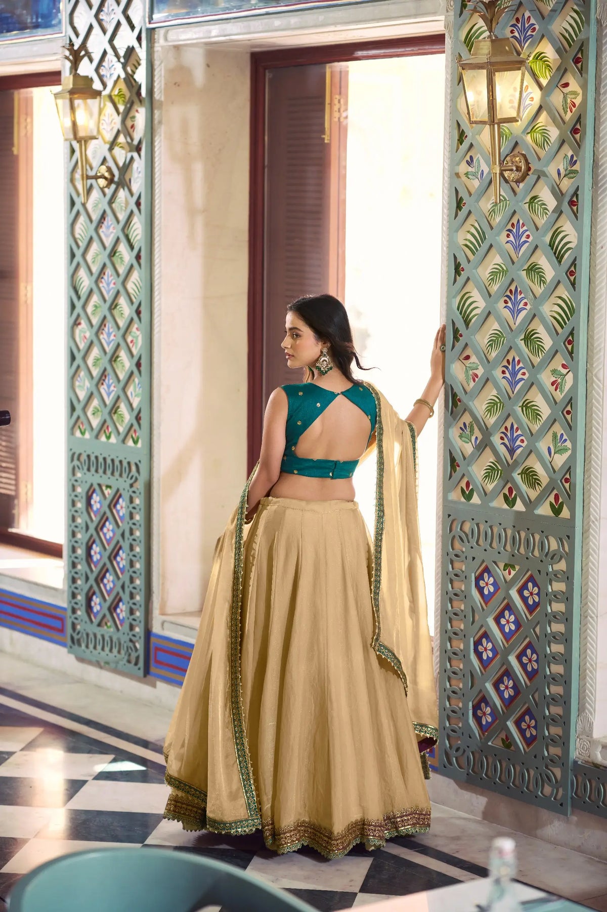 Champagne Fendi Lehenga with Teal Blouse