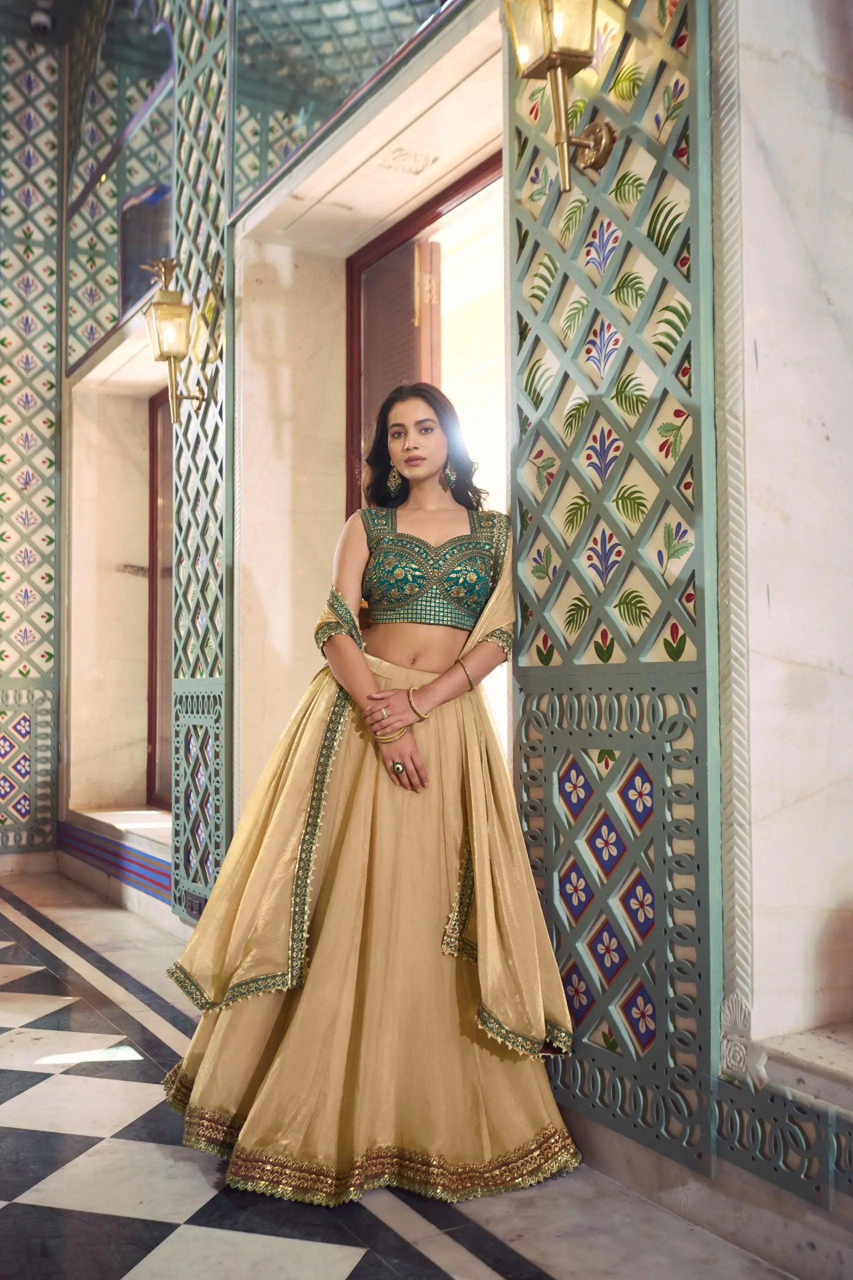 Champagne Fendi Lehenga with Teal Blouse