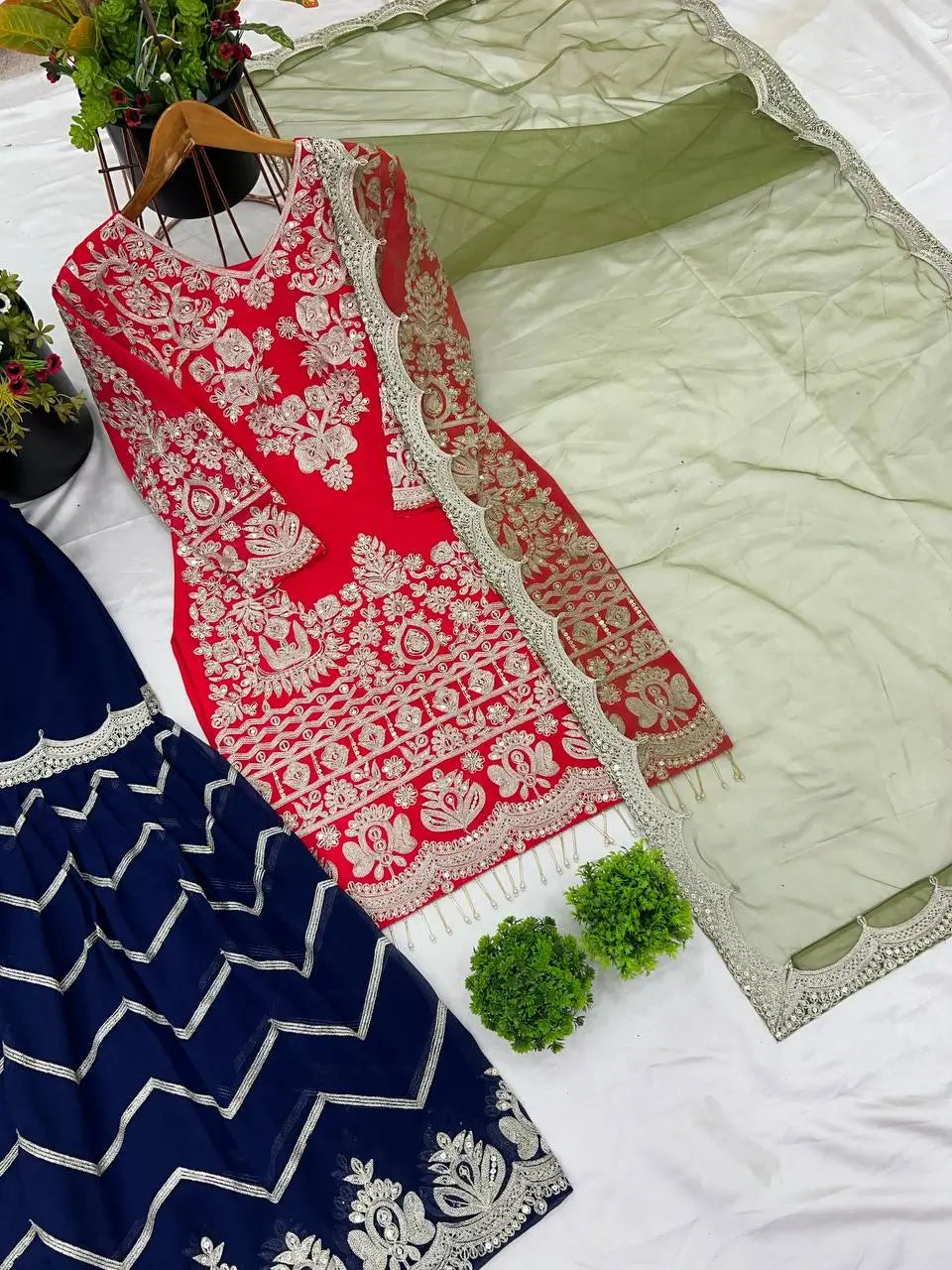 Crimson Elegance Faux Georgette Embroidered Plazzo Set