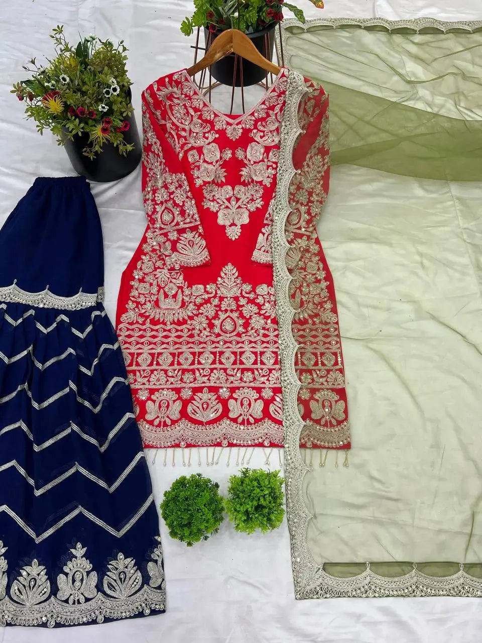 Crimson Elegance Faux Georgette Embroidered Plazzo Set