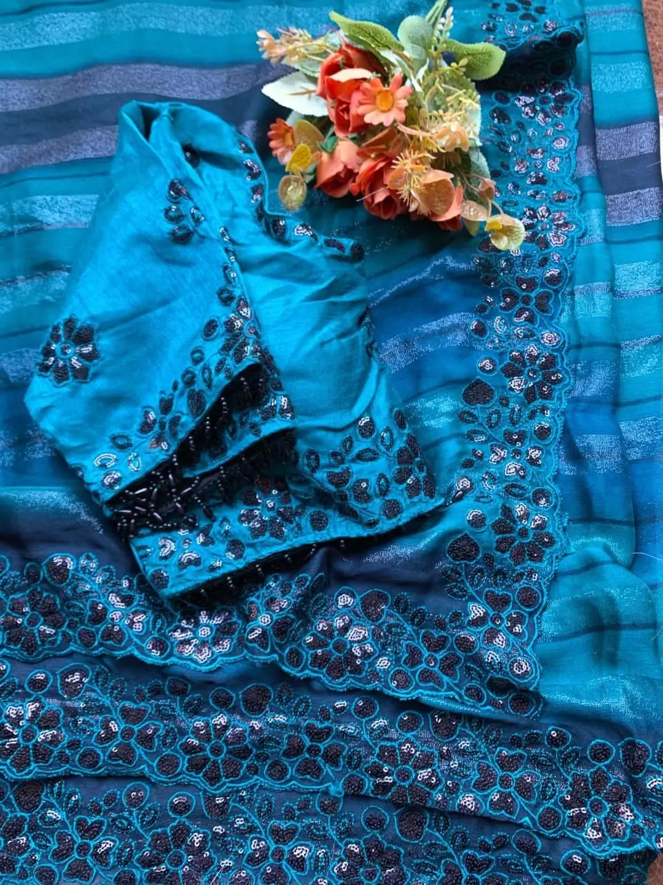 Designer Embroidered Chiffon Silk Saree with Stitched Blouse for Festive and Party Wear