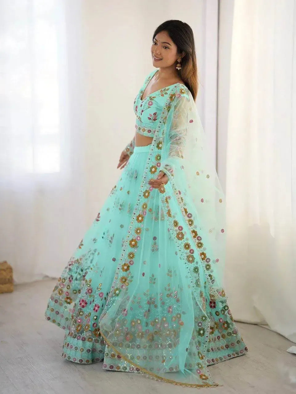 Designer Embroidered Net Lehenga Choli with Dupatta
