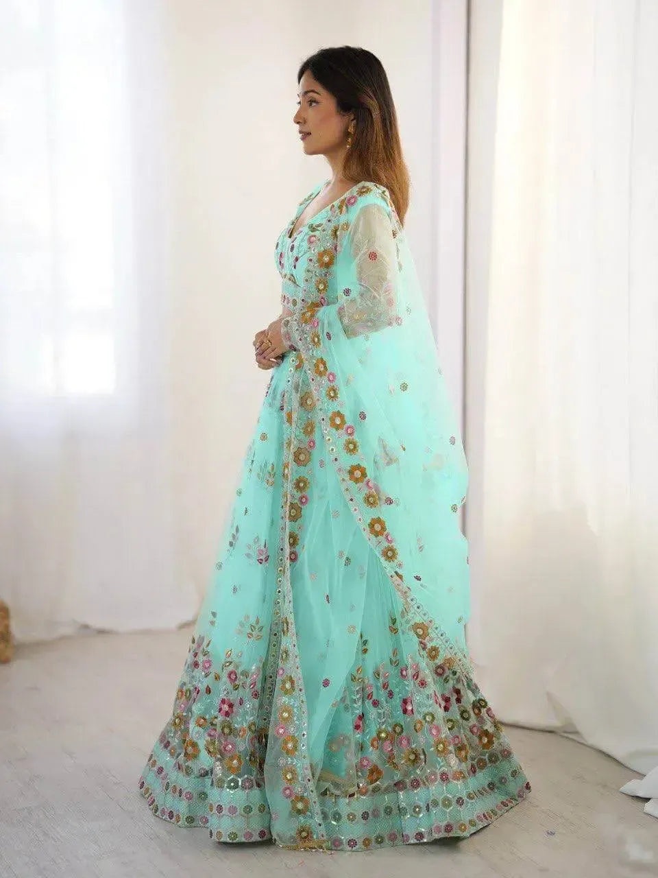 Designer Embroidered Net Lehenga Choli with Dupatta