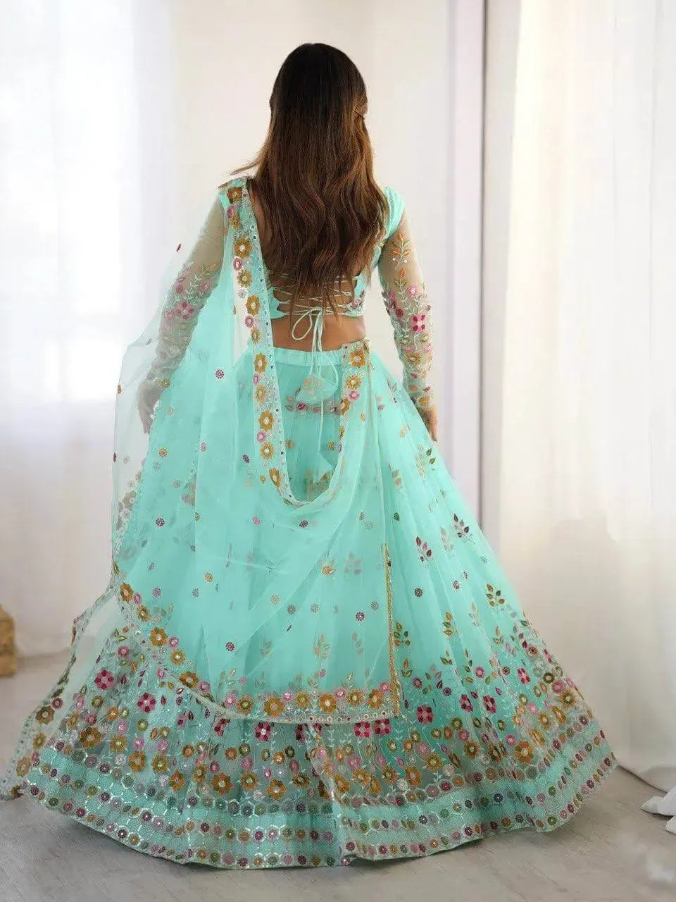 Designer Embroidered Net Lehenga Choli with Dupatta