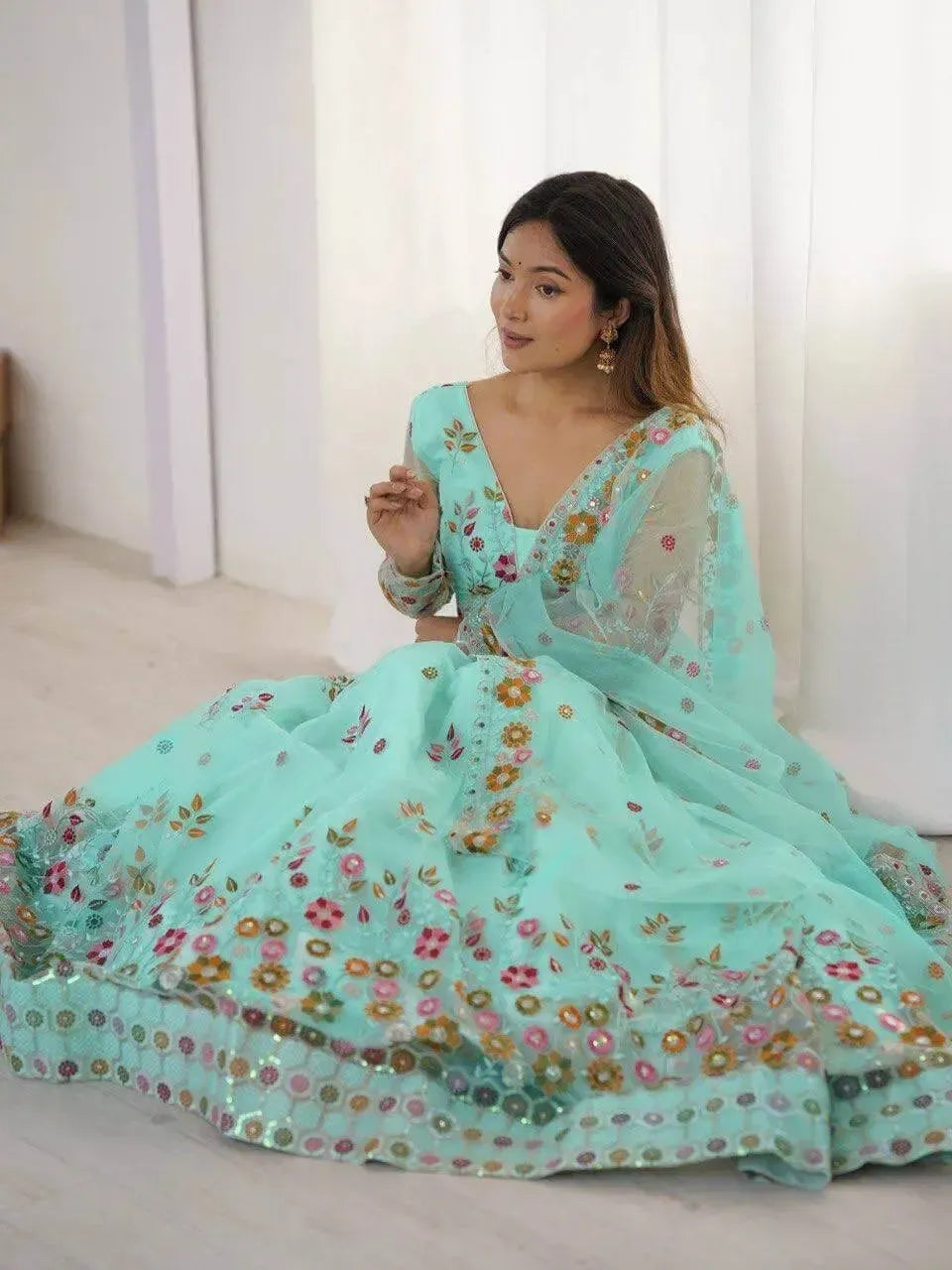 Designer Embroidered Net Lehenga Choli with Dupatta