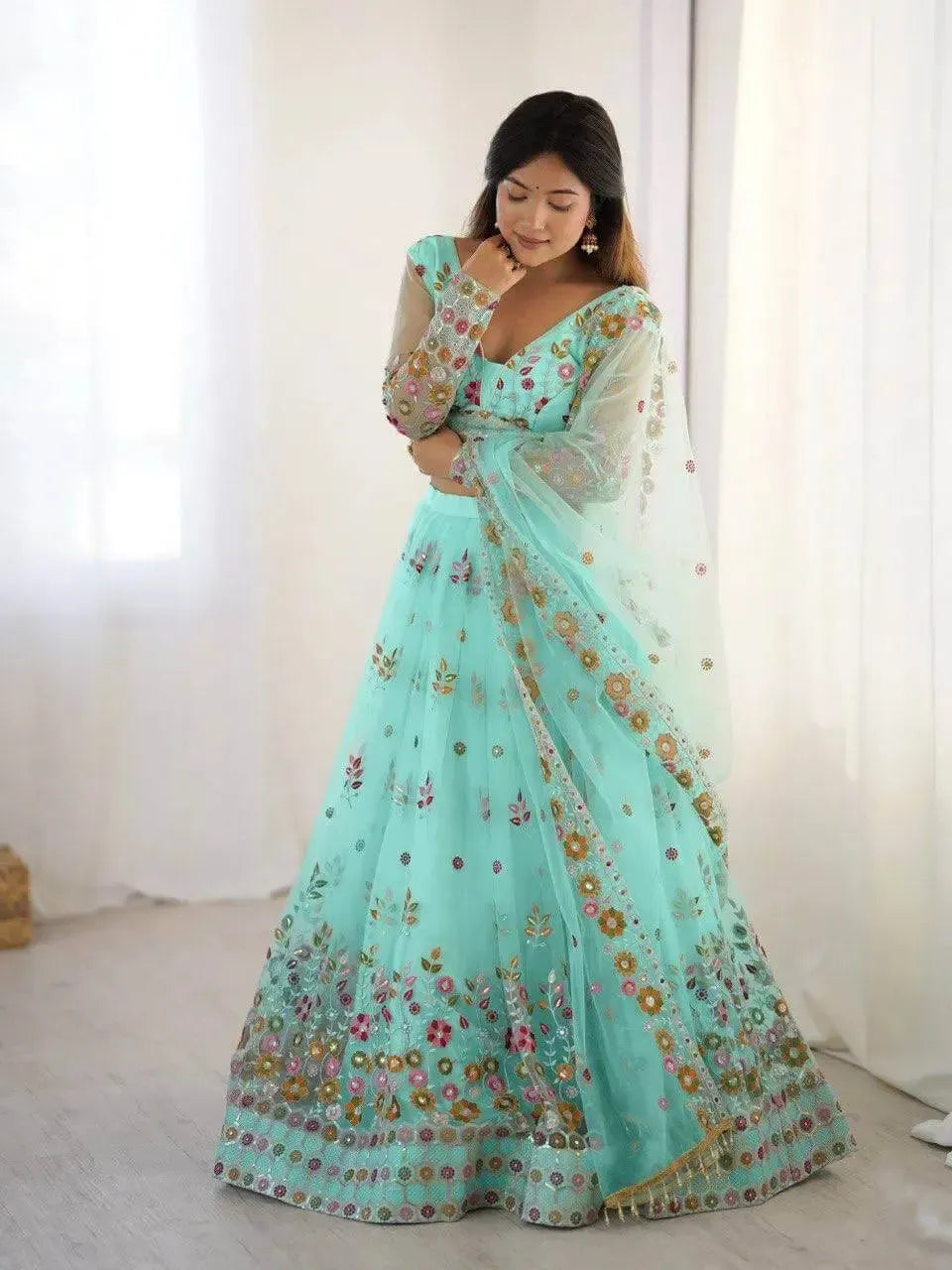Designer Embroidered Net Lehenga Choli with Dupatta
