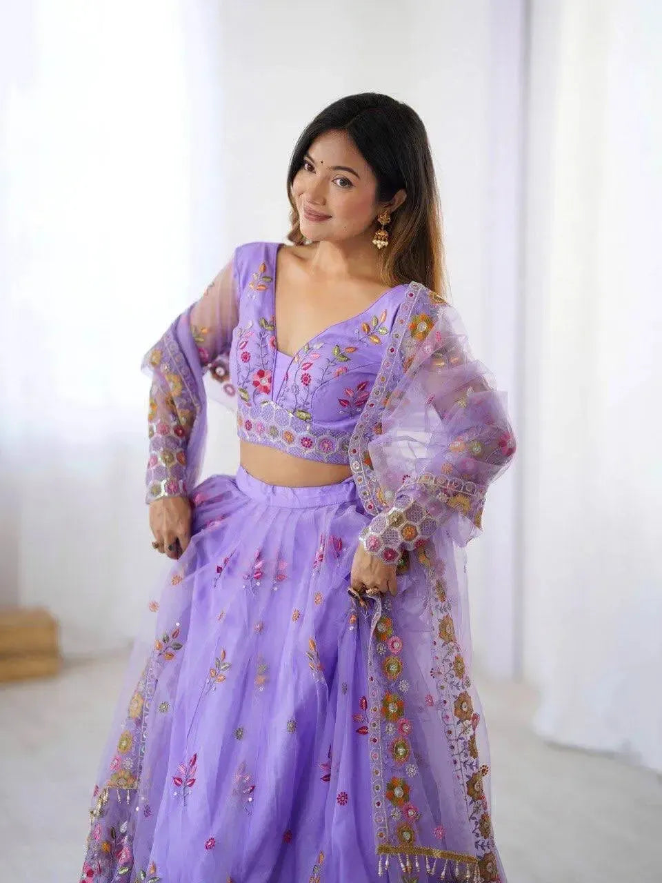 Designer Embroidered Net Lehenga Choli with Dupatta