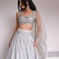 Embroidered Satin Silk Lehenga Set With Net Dupatta