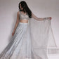 Embroidered Satin Silk Lehenga Set With Net Dupatta
