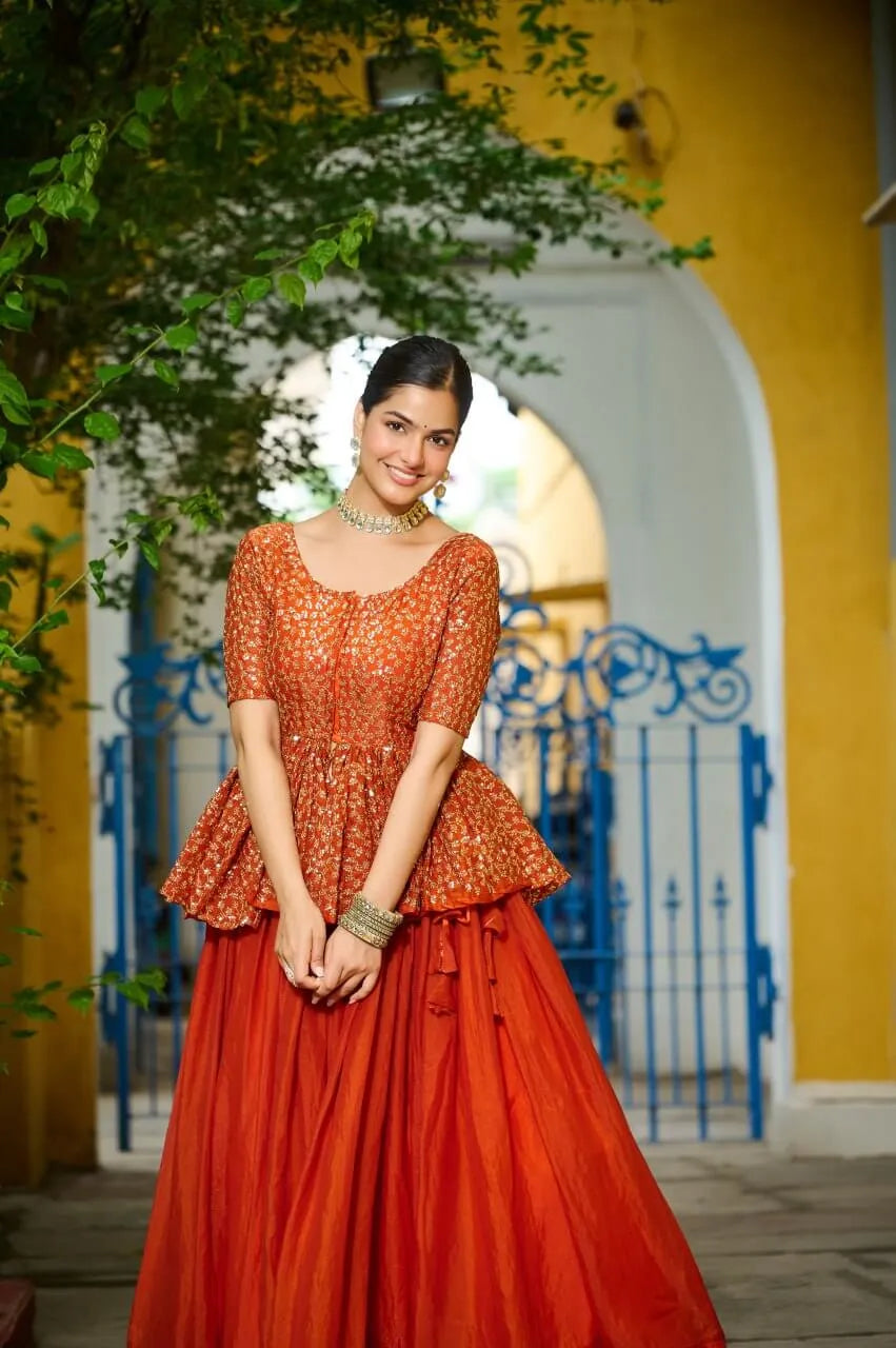 Fendy Embroidered Peplum Blouse with Flared Lehenga – Festive & Wedding Wear