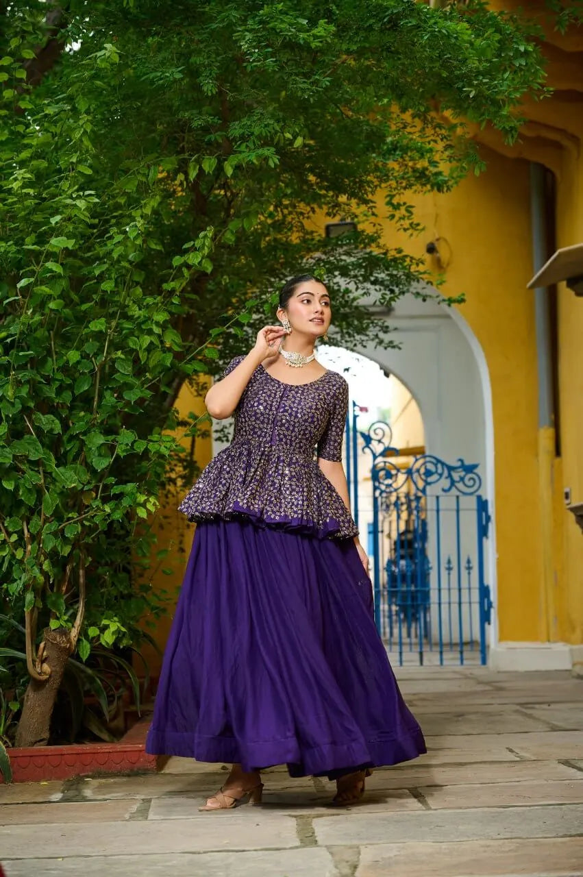 Fendy Embroidered Peplum Blouse with Flared Lehenga – Festive & Wedding Wear