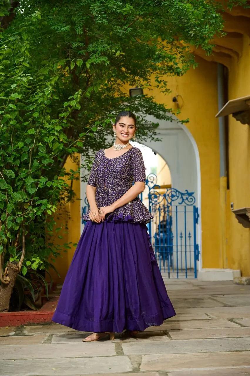 Fendy Embroidered Peplum Blouse with Flared Lehenga – Festive & Wedding Wear