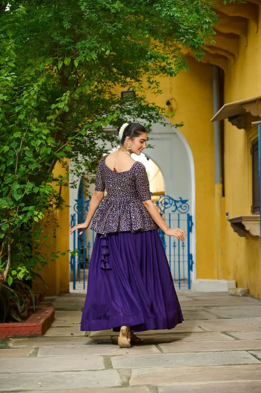 Fendy Embroidered Peplum Blouse with Flared Lehenga – Festive & Wedding Wear