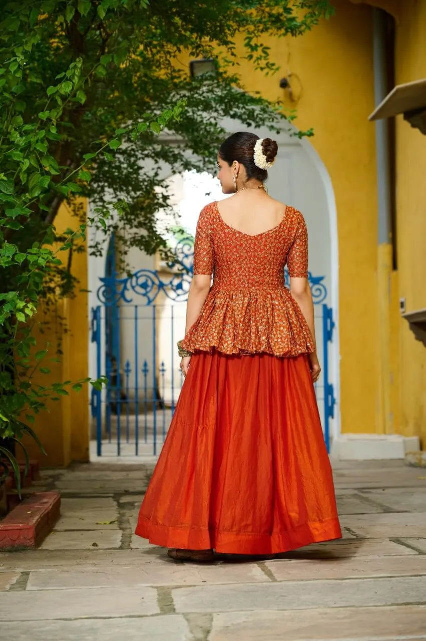 Fendy Embroidered Peplum Blouse with Flared Lehenga – Festive & Wedding Wear