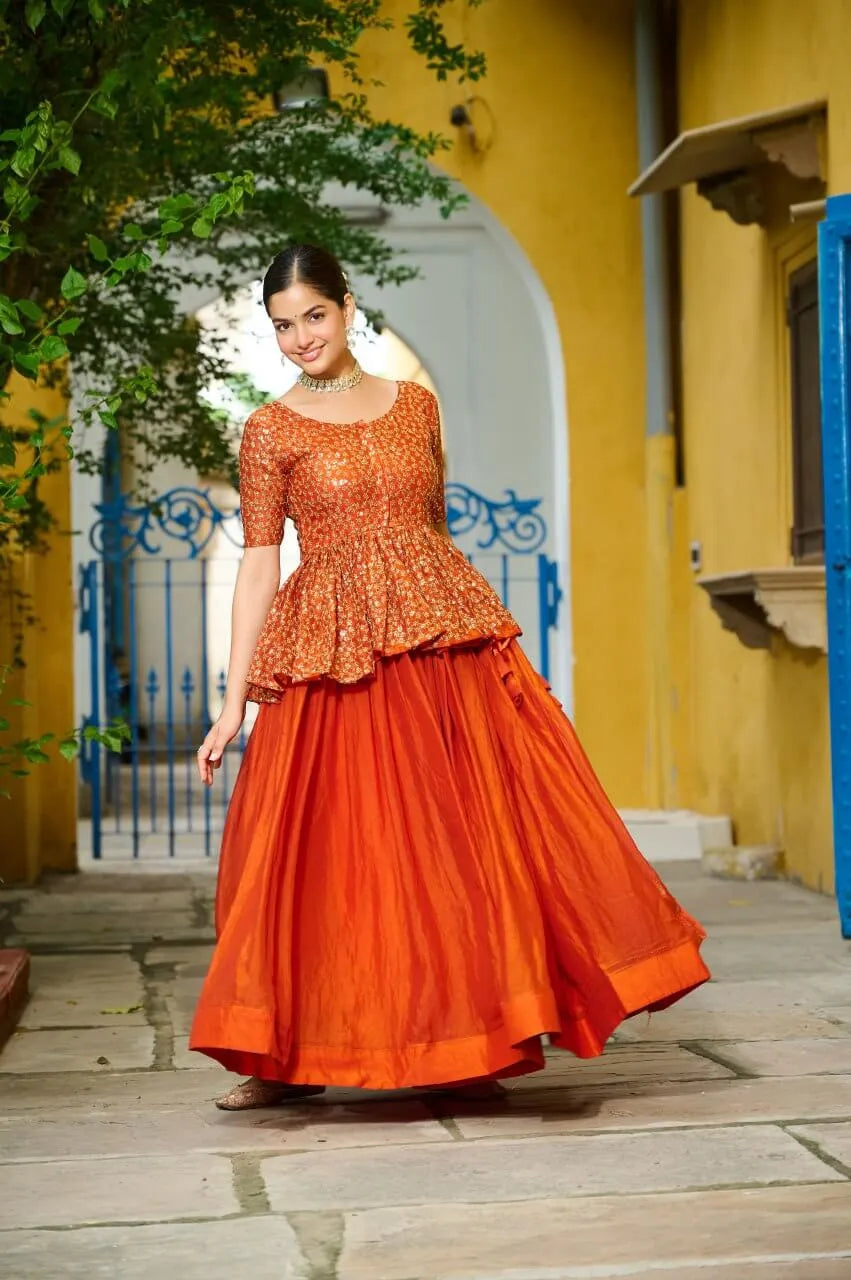 Fendy Embroidered Peplum Blouse with Flared Lehenga – Festive & Wedding Wear
