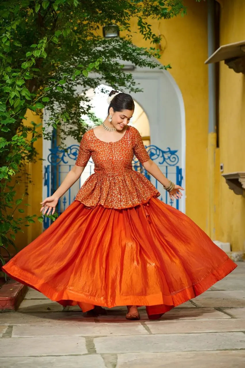 Fendy Embroidered Peplum Blouse with Flared Lehenga – Festive & Wedding Wear