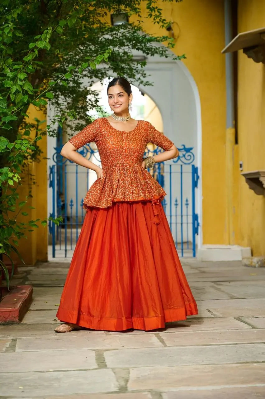 Fendy Embroidered Peplum Blouse with Flared Lehenga – Festive & Wedding Wear