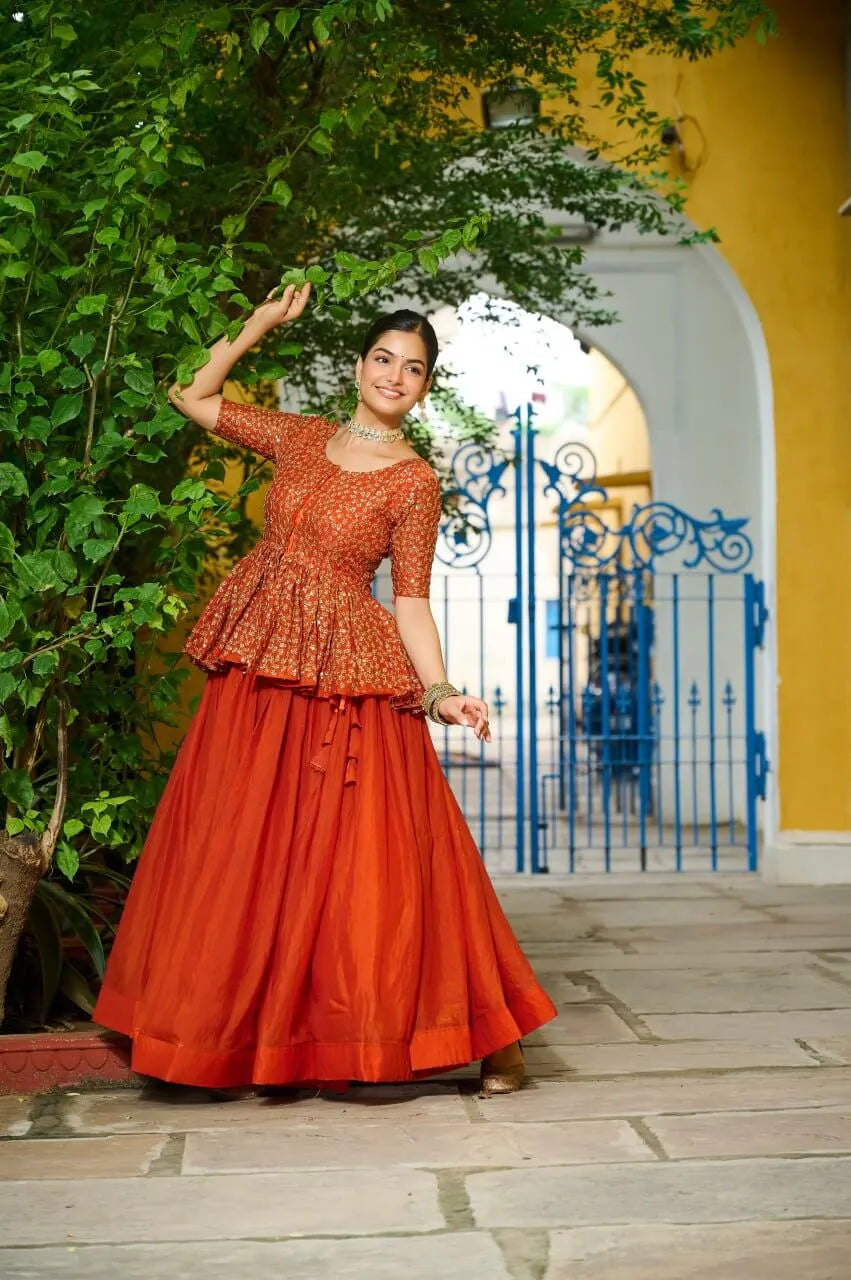 Fendy Embroidered Peplum Blouse with Flared Lehenga – Festive & Wedding Wear