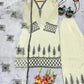 Ivory Pure Natural Crepe Palazzo Set with Black Embroidery and Organza Silk Dupatta for Festive and Elegant Occasions