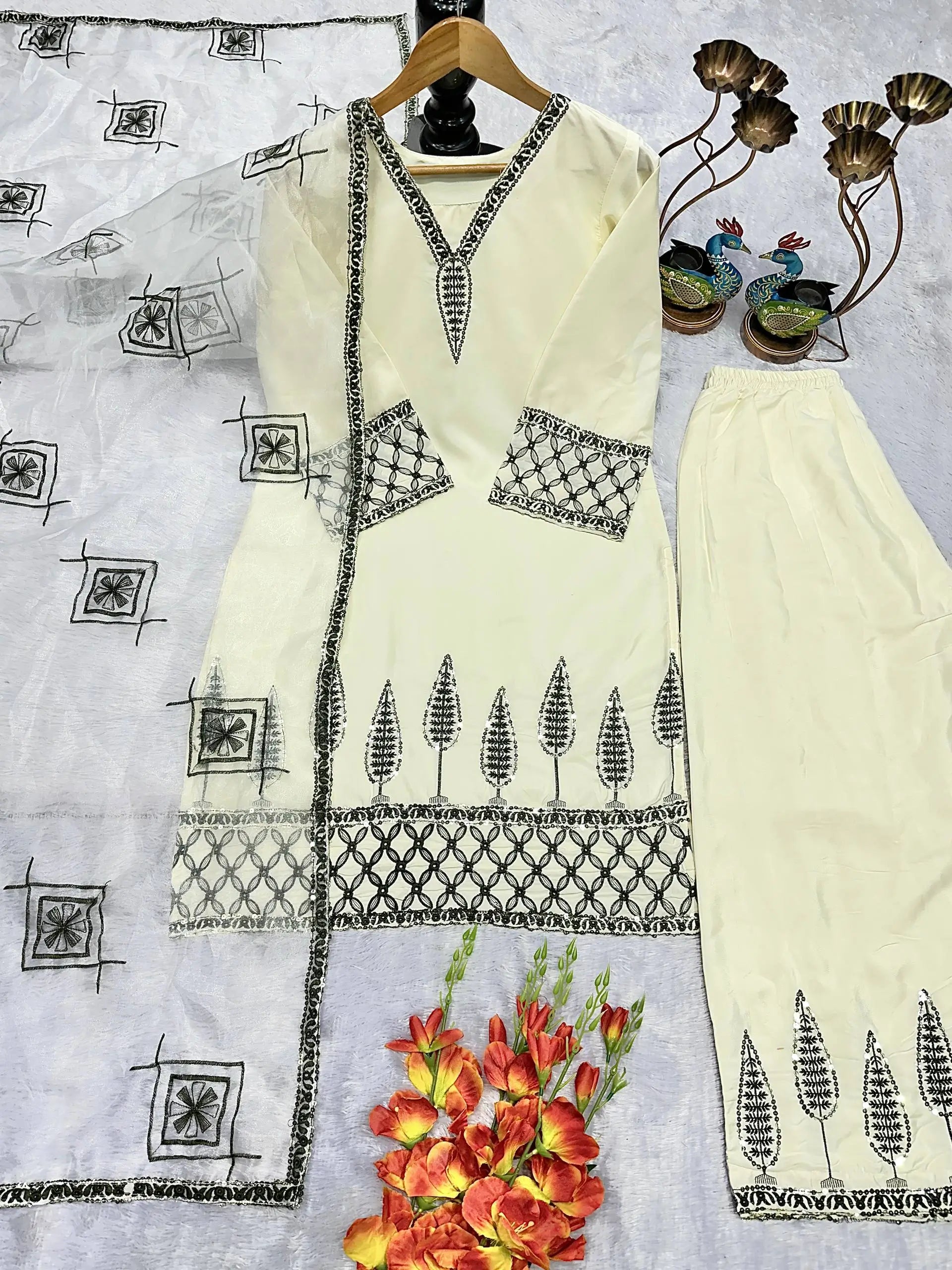 Ivory Pure Natural Crepe Palazzo Set with Black Embroidery and Organza Silk Dupatta for Festive and Elegant Occasions