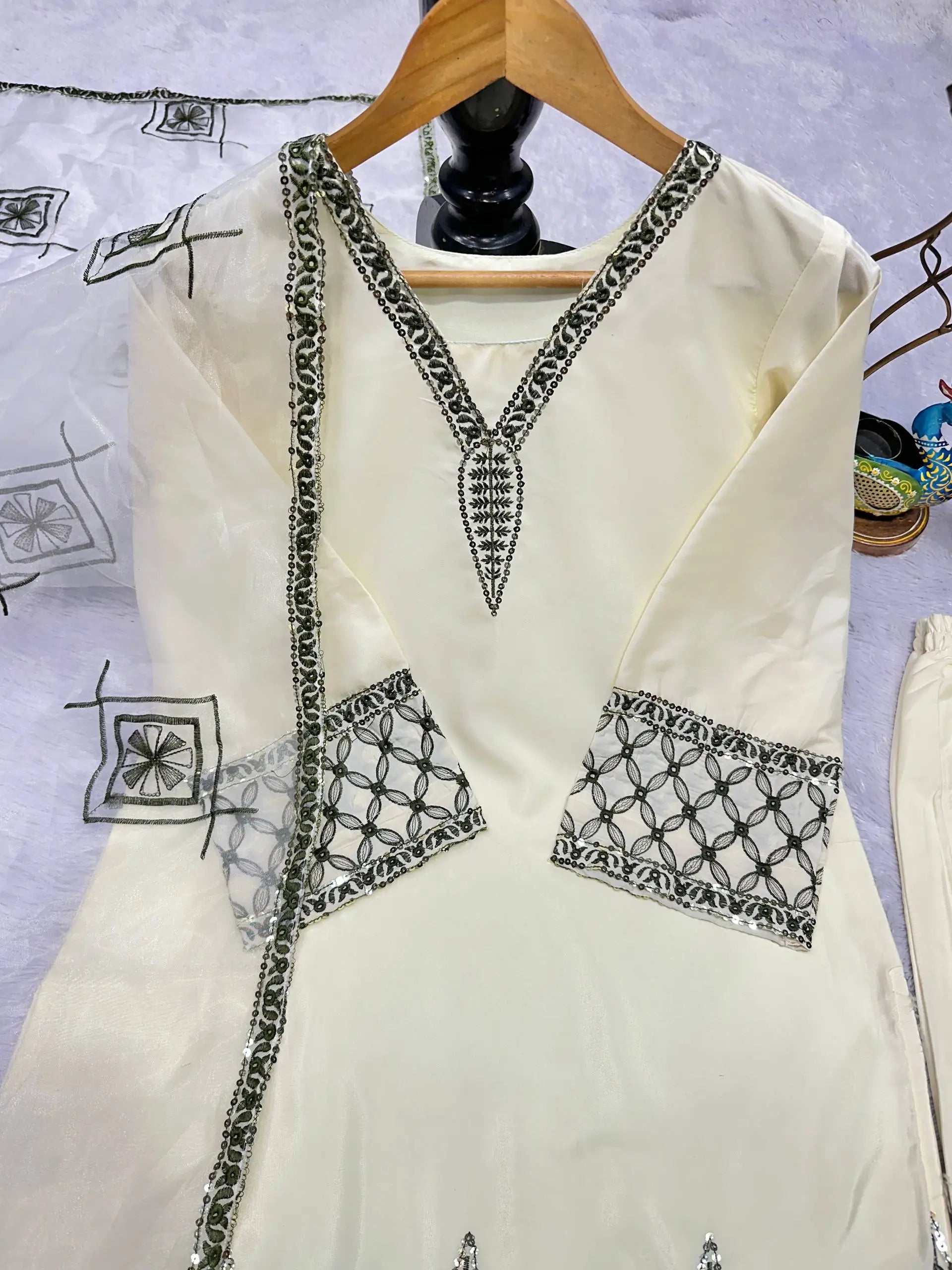Ivory Pure Natural Crepe Palazzo Set with Black Embroidery and Organza Silk Dupatta for Festive and Elegant Occasions