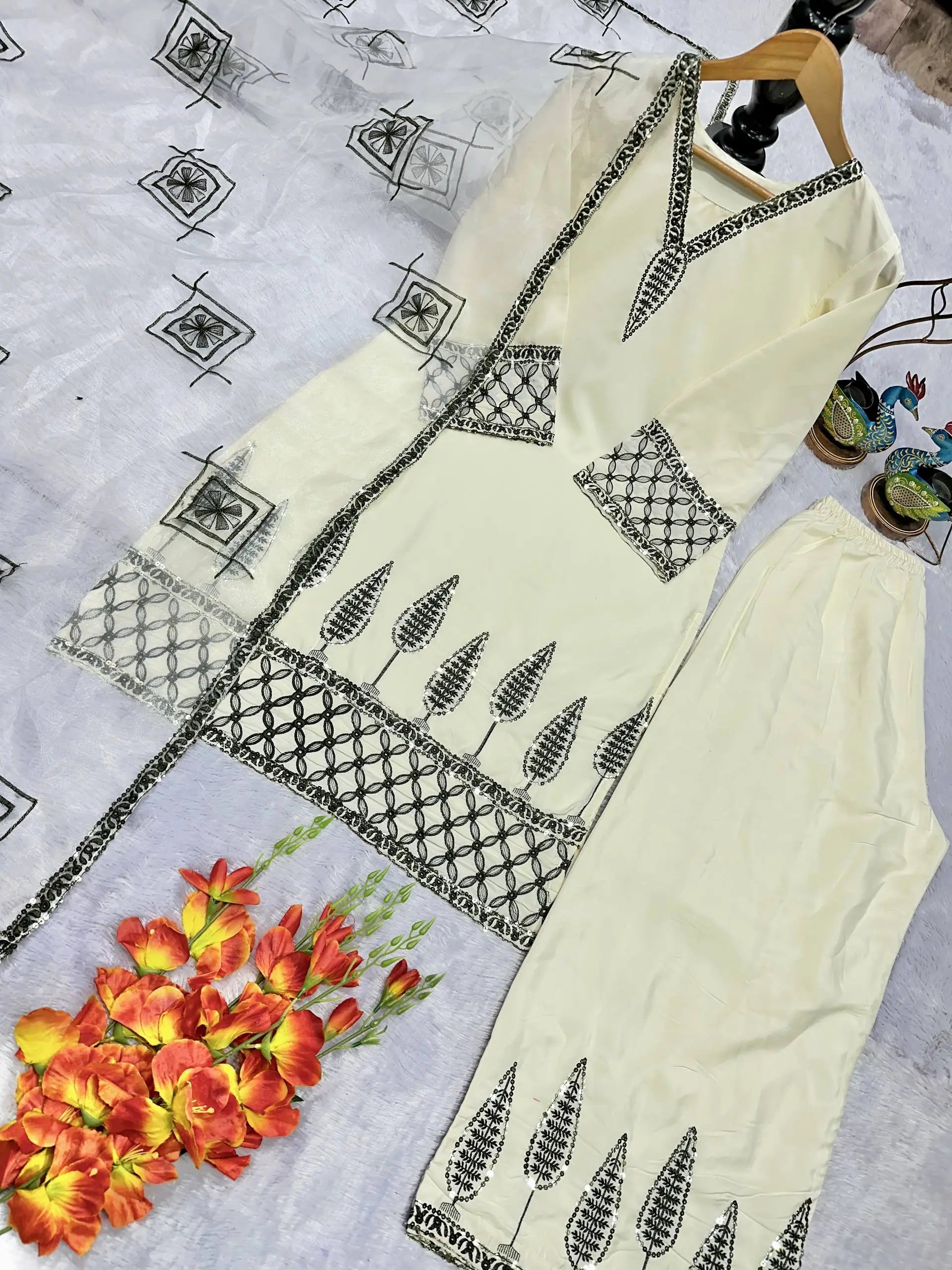 Ivory Pure Natural Crepe Palazzo Set with Black Embroidery and Organza Silk Dupatta for Festive and Elegant Occasions