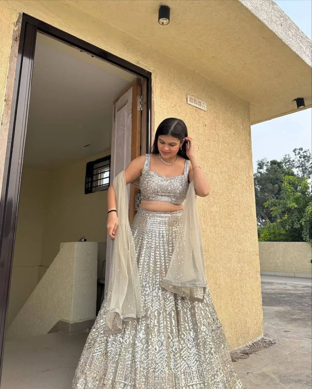 Ivory Silver Embroidered Faux Georgette Lehenga Set