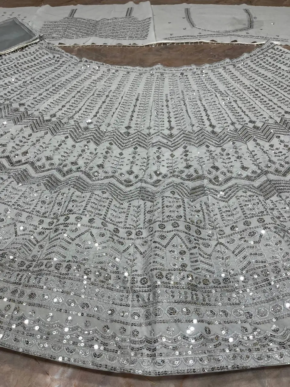 Ivory Silver Embroidered Faux Georgette Lehenga Set
