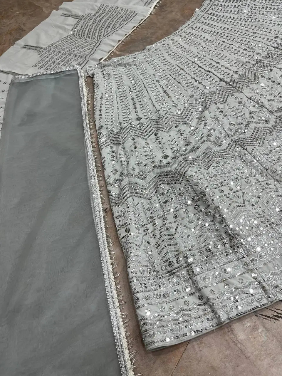 Ivory Silver Embroidered Faux Georgette Lehenga Set