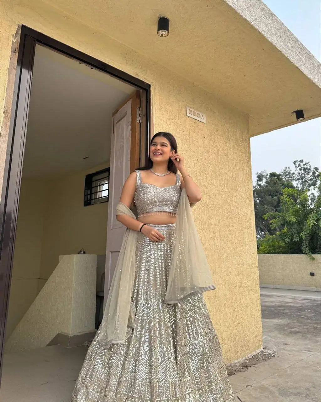 Ivory Silver Embroidered Faux Georgette Lehenga Set