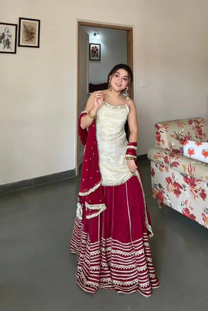 Ivory and Rani Pink Fendy Silk Lehenga Set with Real Mirror Work and Lace Detail