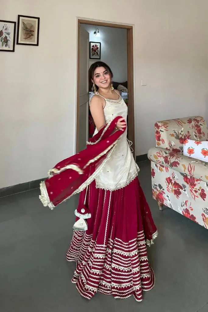 Ivory and Rani Pink Fendy Silk Lehenga Set with Real Mirror Work and Lace Detail