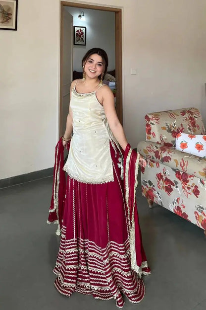 Ivory and Rani Pink Fendy Silk Lehenga Set with Real Mirror Work and Lace Detail