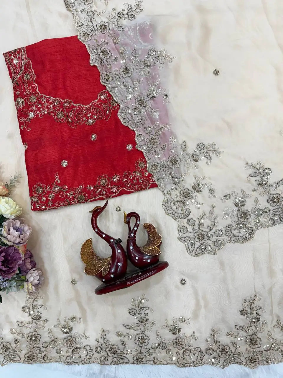 Rangoli Silk Saree with Red Embroidered Blouse