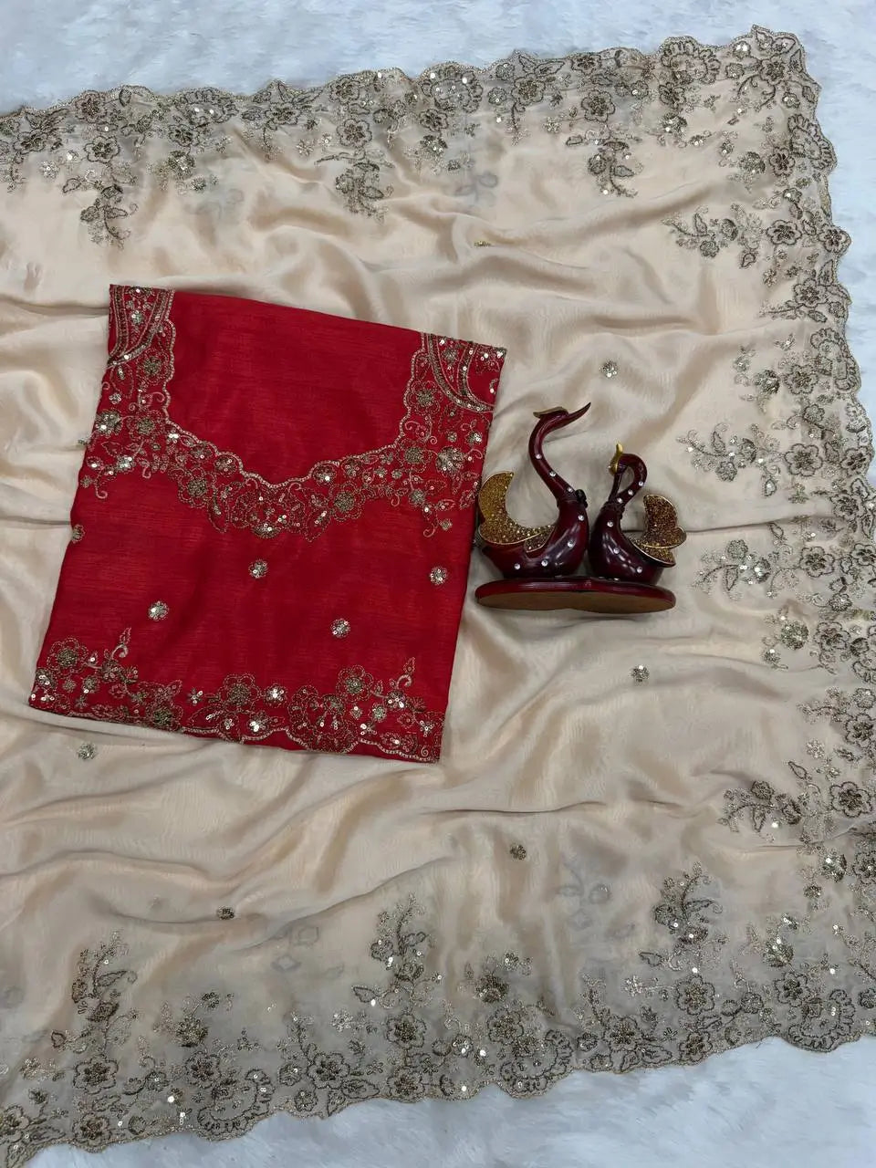 Rangoli Silk Saree with Red Embroidered Blouse