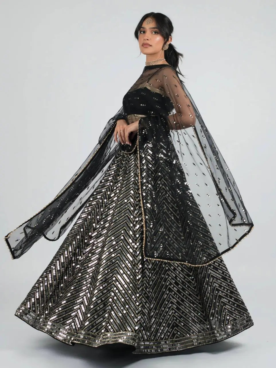 Sequins Embroidered Georgette Lehenga Choli with Net Dupatta for Festive and Party Wear