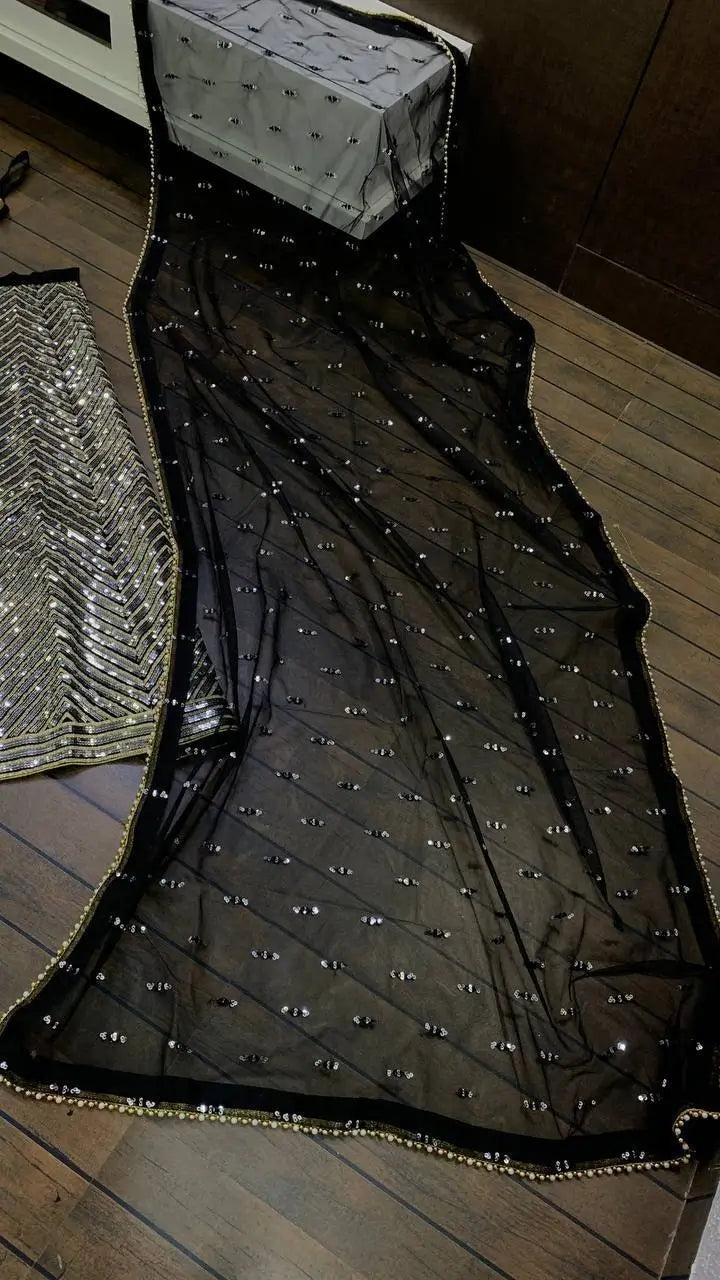 Sequins Embroidered Georgette Lehenga Choli with Net Dupatta for Festive and Party Wear
